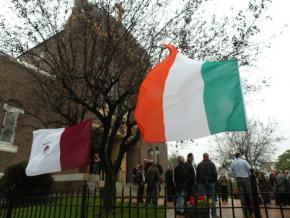 Community mourns: The flags of Ireland and County Galway flew outside St. Mark's Church on Dorchester Ave. this morning after the funeral Mass for murder victim Ciaran Conneely. Photo by Pat Tarantino